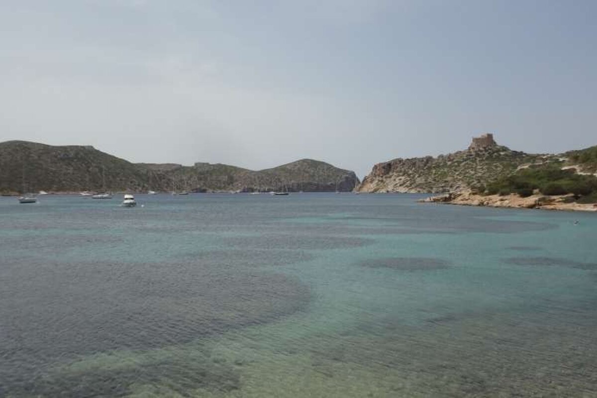 Bay of cabrera with castle in background