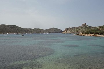 Bay of cabrera with castle in background