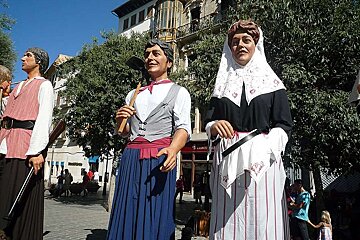 a photo of giant puppets in palma festival