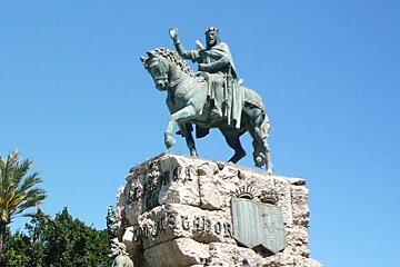 a photo of a man on a horse statue