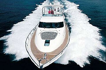 an image of a power boat creating lots of white wash as it cuts through the sea