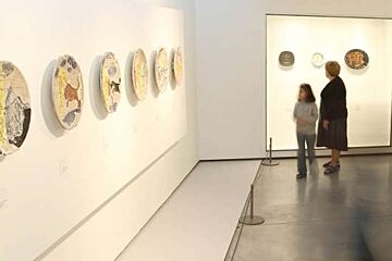 art gallery room with picasso ceramics