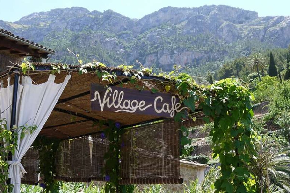 photo of a cafe and mountains