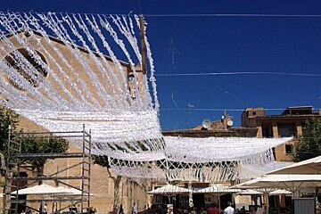 photo of a square decorated with bunting