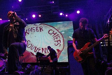 Kaiser Chiefs playing on stage