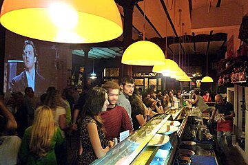 a photo of people in a bar