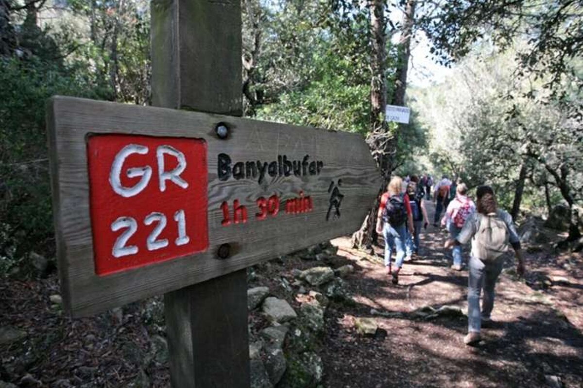a photo of a hiking sign and path in majorca