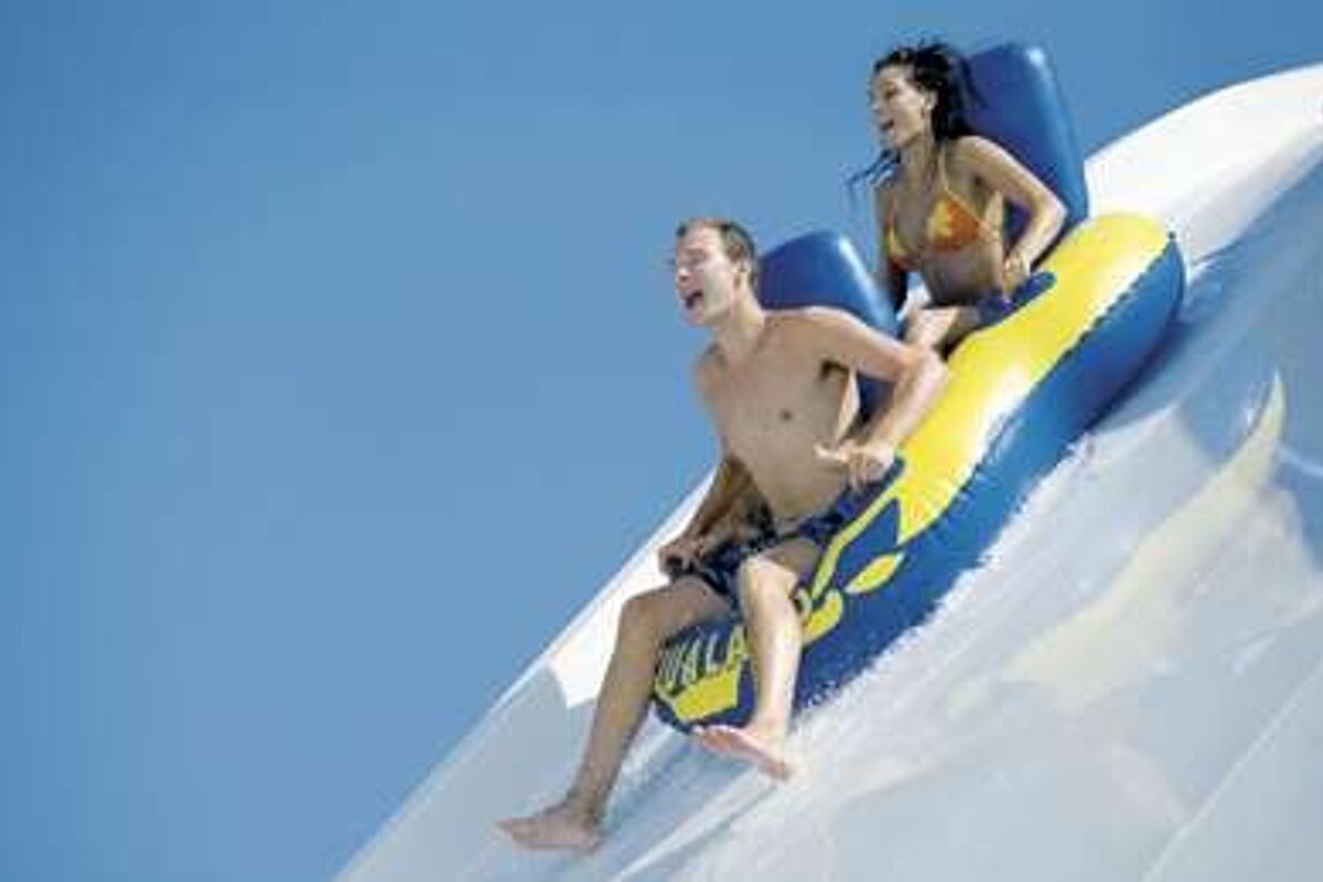 Man and woman on water ride