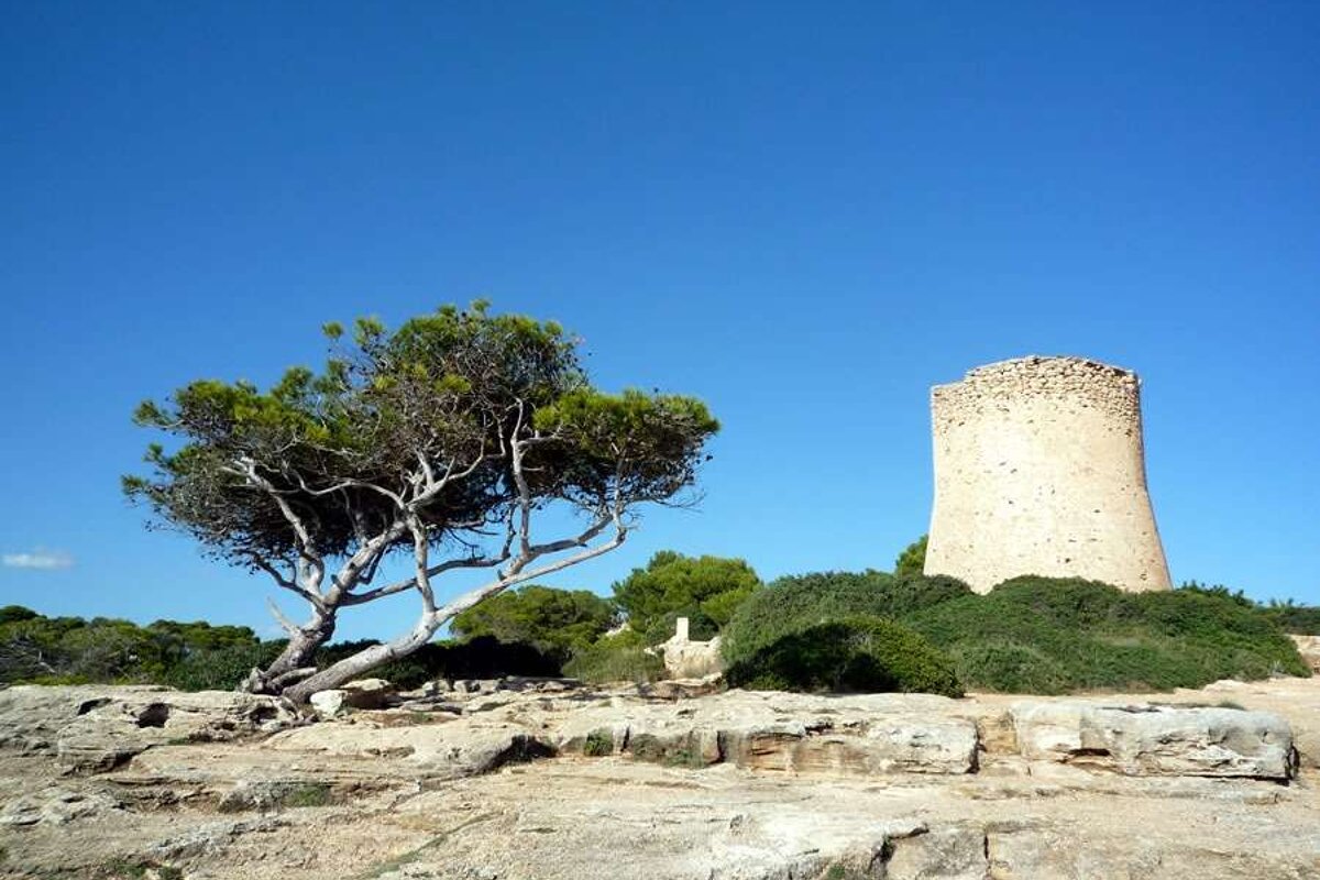 a photo of an old sea watch tower in cala pi majorca