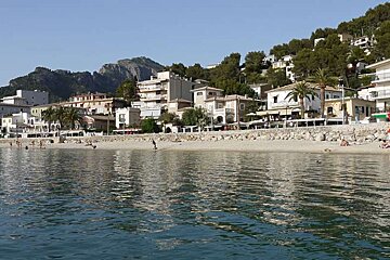 photo of sea, beach, town and hills