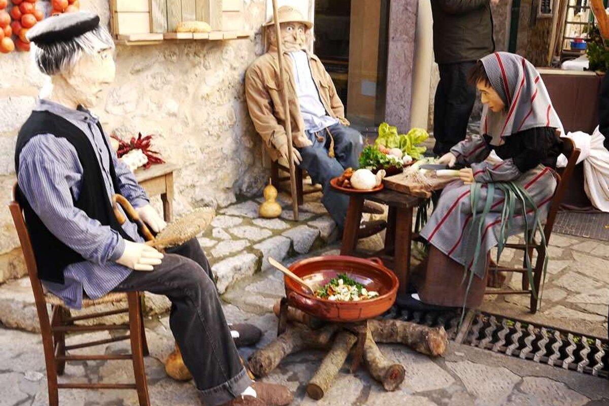 a photo of traditional stuffed puppets at a majorcan fair