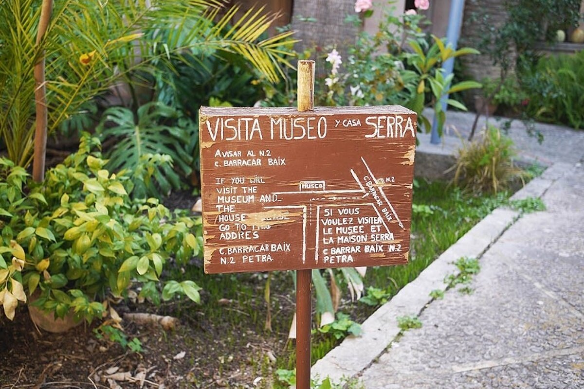 a photo of the sign for serra museum petra mallorca majorca