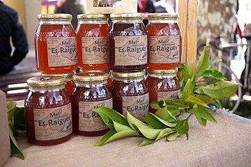 a photo of jars of majorcan honey