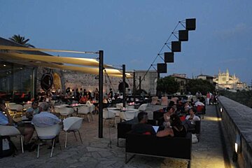 terrace with cathedral in background
