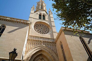 a photo of the front of a church in majorca
