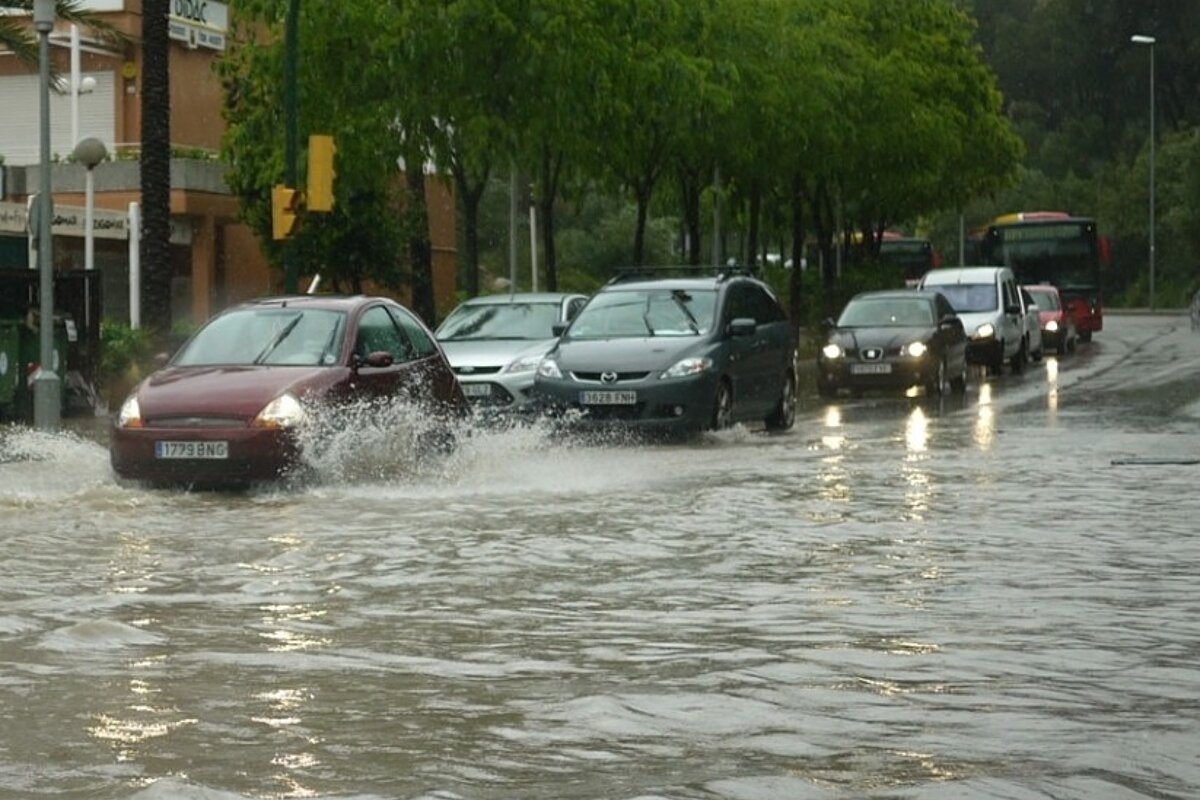 A photo of cars on flooded roads