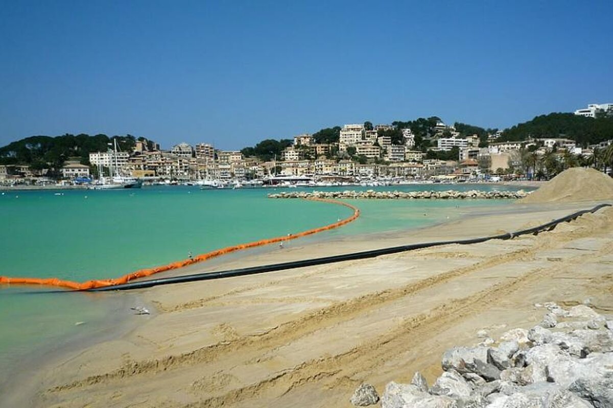 photo of new sandy beach bay with blue sea