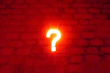 a photo of a lit up question mark