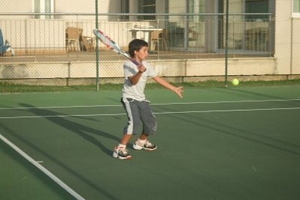 a photo of a lesson at eu moll tennis club mallorca majorca