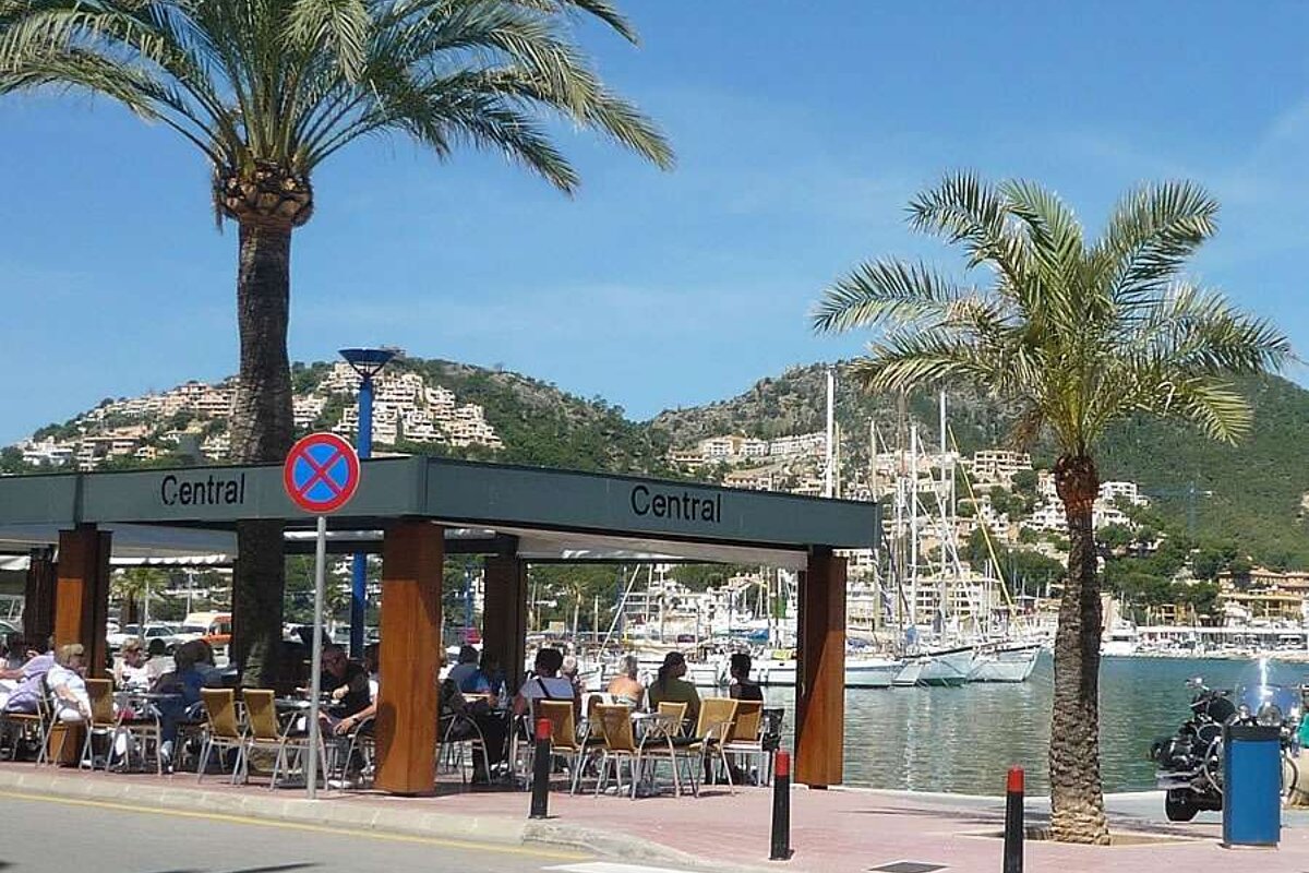 a photo of a cafe by the harbour
