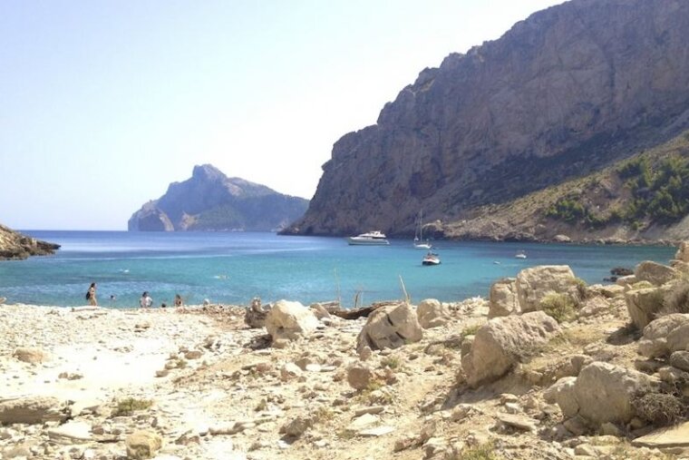 photo of a pebble beach and a sea cove