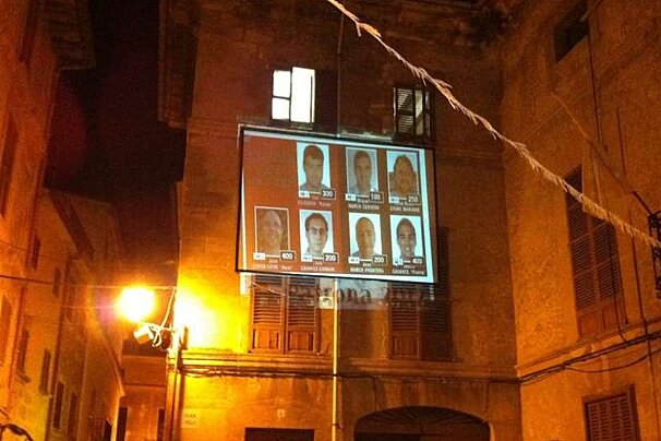 photo of a bill board on a building