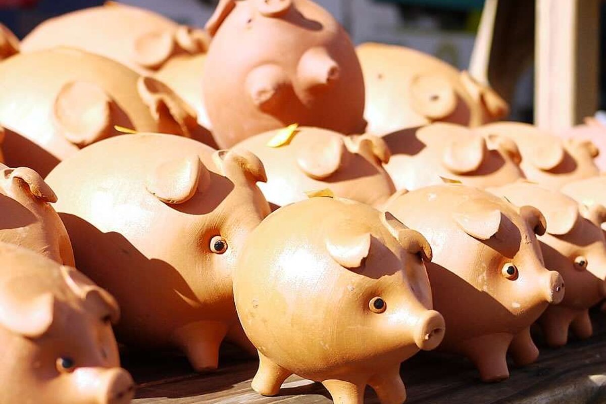 a photo of clay piggy banks