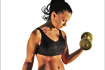 a photo of a woman lifting weights