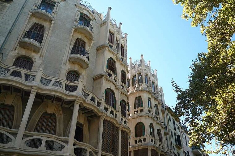 a photo of modernism building facade in palma majorca