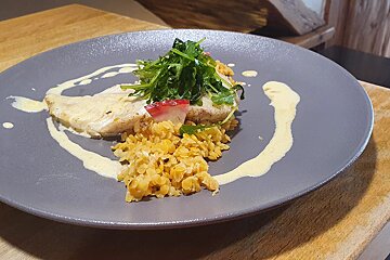 A close up of a plate of food on a table