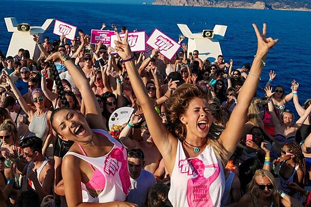 people partying on a boat in ibiza