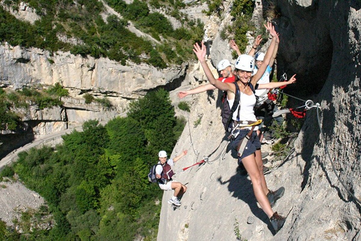 a group of people doing via ferrata
