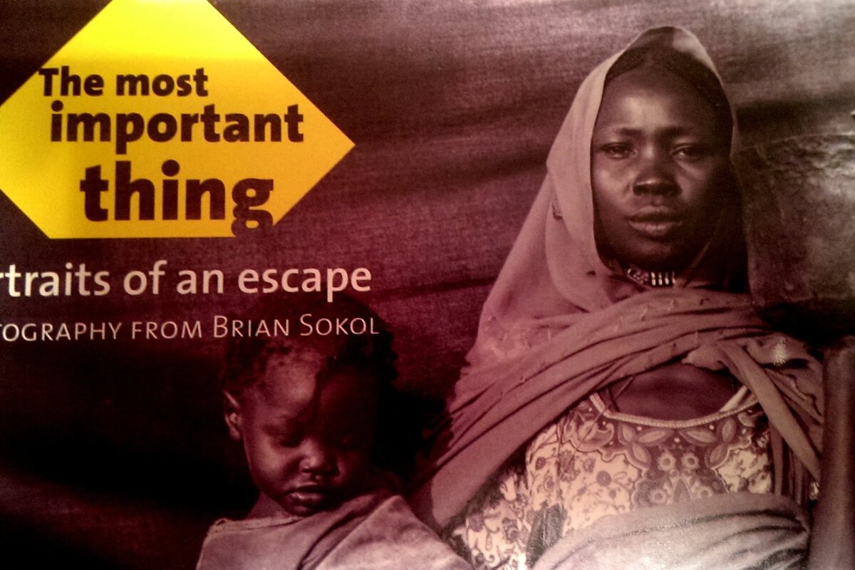 the poster for Portraits of an Escape exhibition in Palma