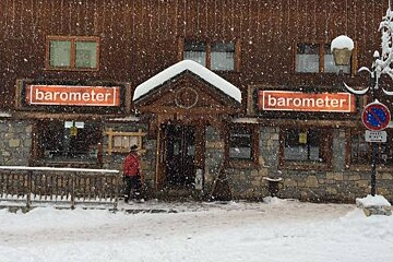 a snowy bar in meribel