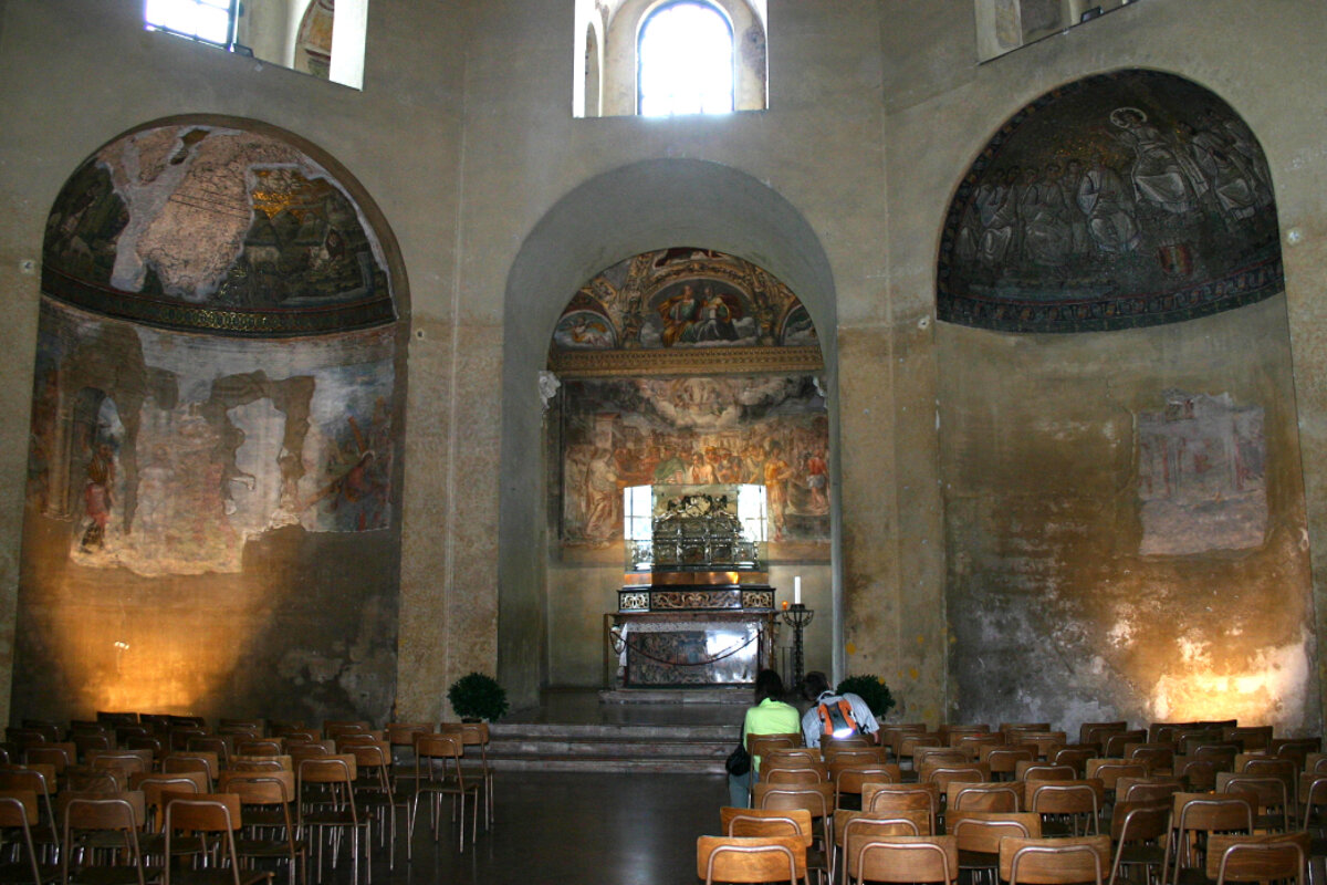 A church with a painting of jesus on the wall