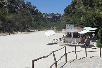 a small shack on a beach in mallorca