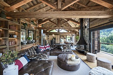 A living room with a british flag on the couch