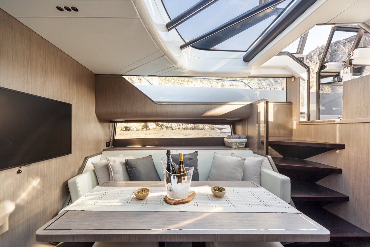 A table with a bottle of wine on it