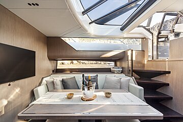 A table with a bottle of wine on it