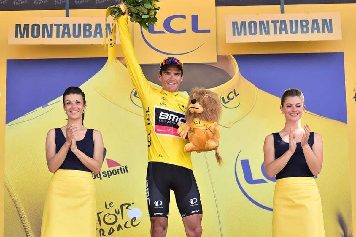 a cyclist in the yellow jersey of the tour de france