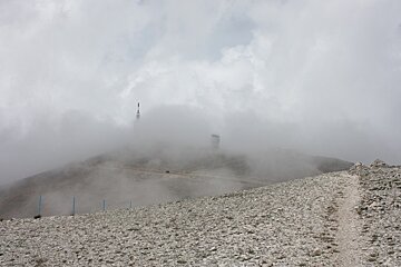 the summit of the mountain in clouds
