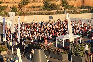 outdoor yoga session at port adriano mallorca