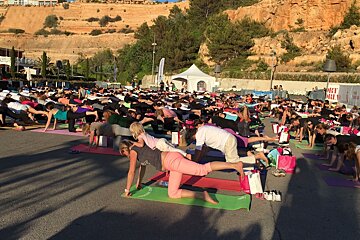 outdoor yoga session at port adriano mallorca