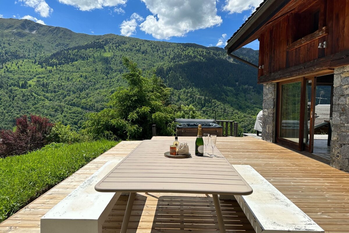 A table with a bottle of champagne on it