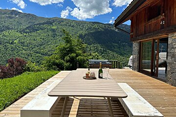 A table with a bottle of champagne on it