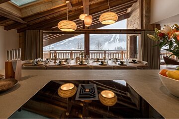 A kitchen with a stove that says faber on it