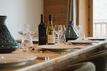 A bottle of dr. lucas wine sits on a table