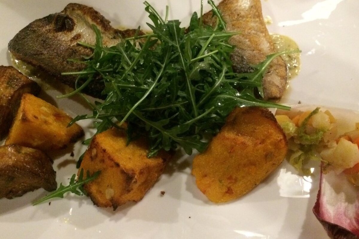 a fish main course in a morzine rtestaurant