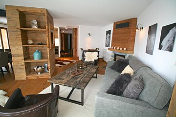 A living room with a couch and a coffee table