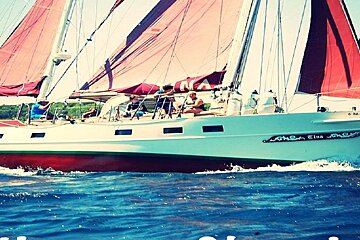 A sailboat with the name tina on the side